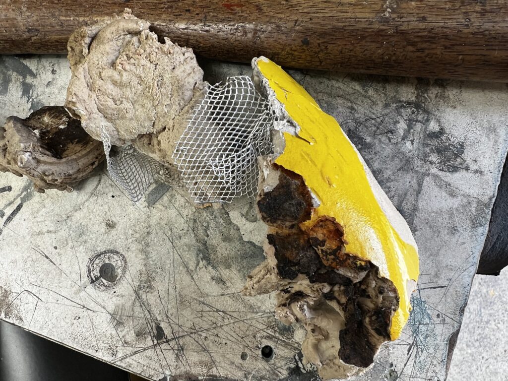Wire mesh and filler found on classic VW Camper Van.