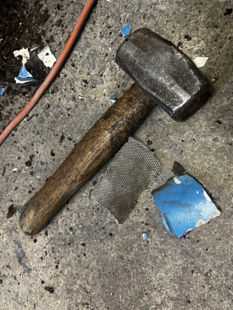 Wire mesh and filler found in a classic VW Camper van while doing repairs.